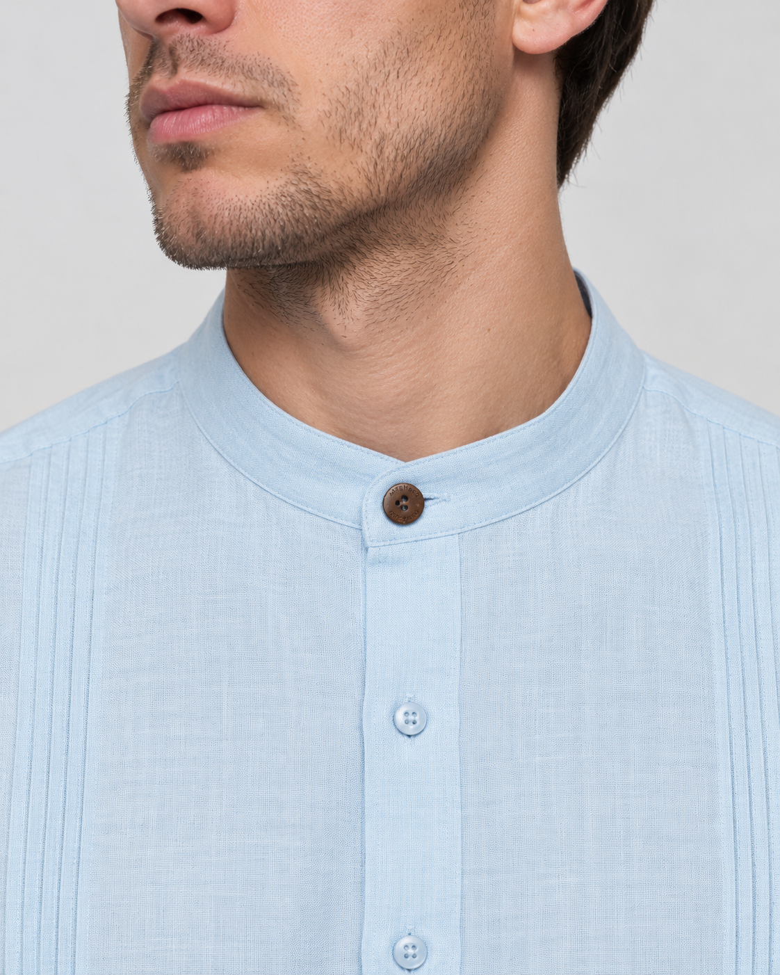 CAMISA MAO ALFORZAS CELESTE